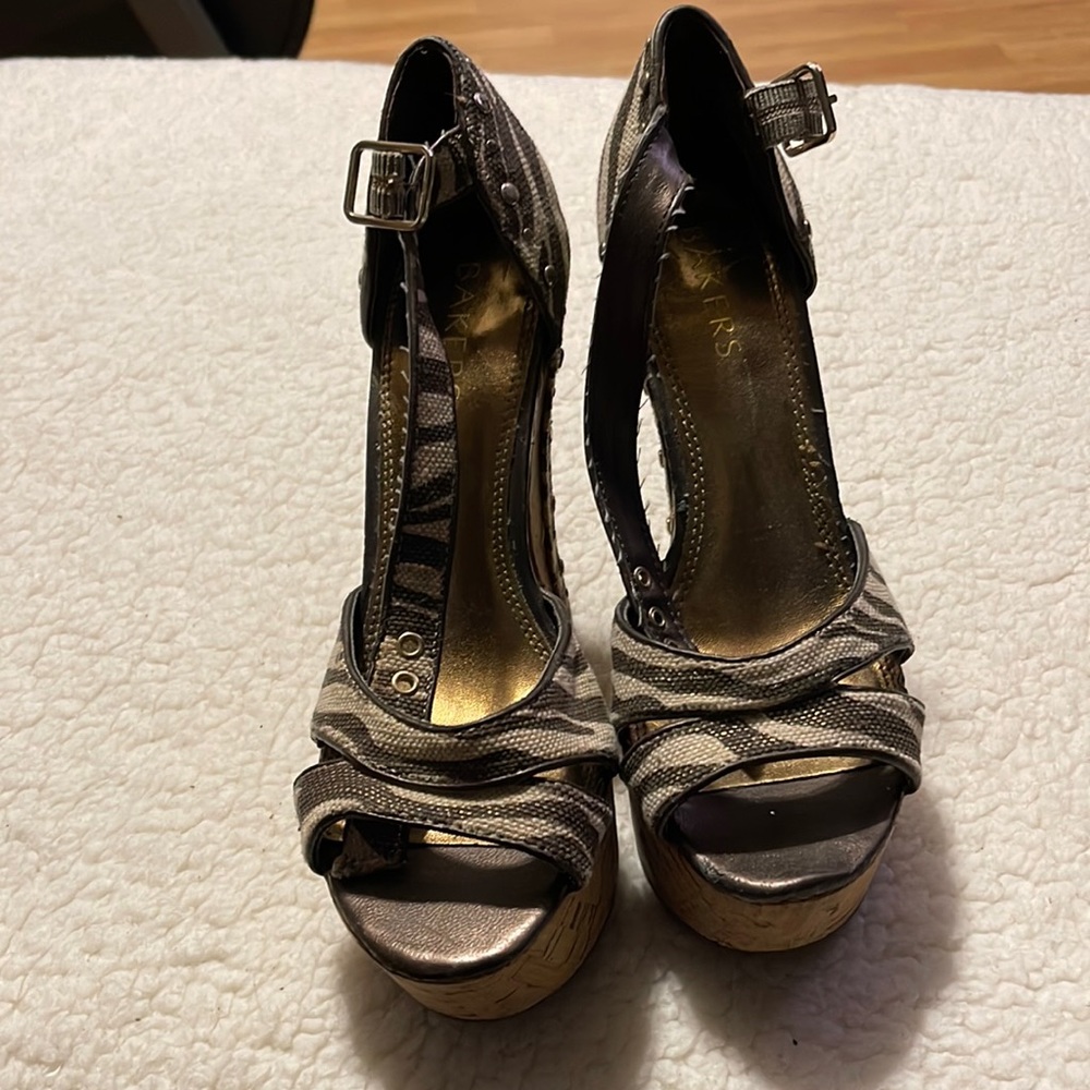 Bakers,size 6 medium, tan and brown zebra print wedges with a cork heel